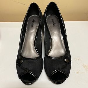 Black peep toe heels from Abella. Cloth with leather trim. Excellent condition.